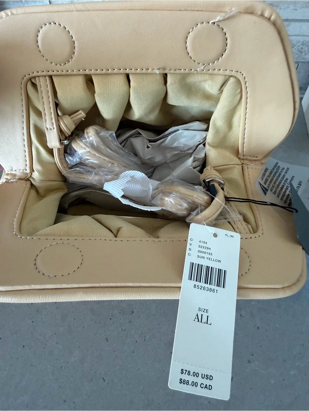 NWT Anthropologie Elegant light soft yellow Gathered Leather Clutch